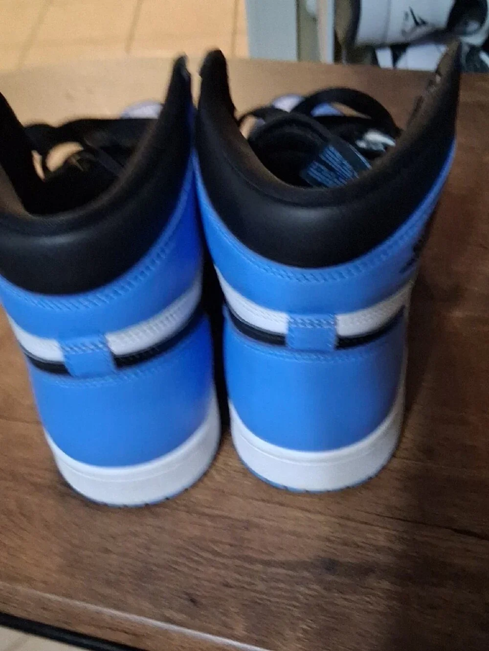 Jordan 1 High-Top in Black, White & University Blue